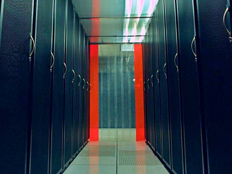 Cold aisle cabinet rows in Datacate's Rancho Cordova data center