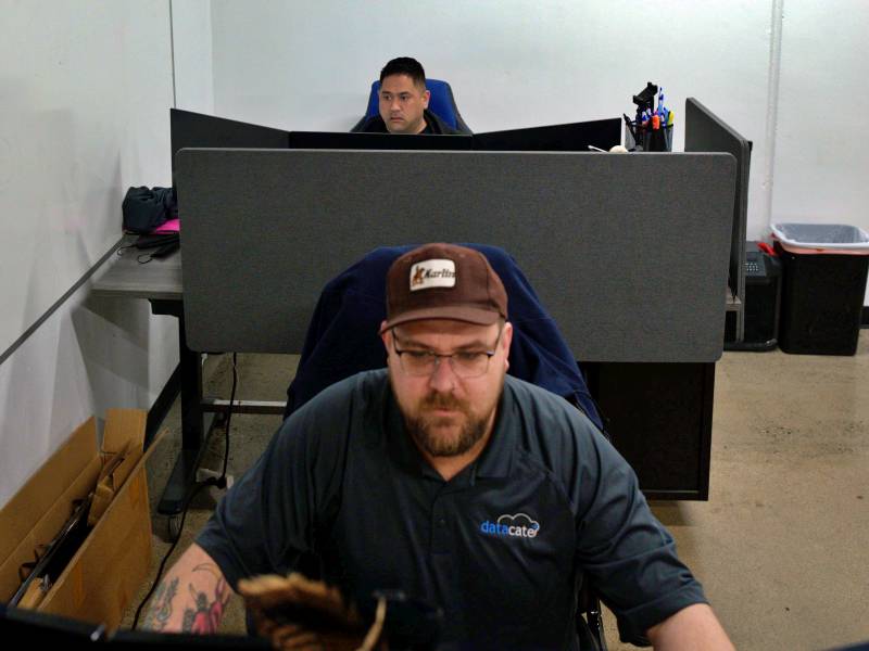 Emory Hayes and Aaron Bettinger working at Datacate's Rancho Cordova, CA NOC