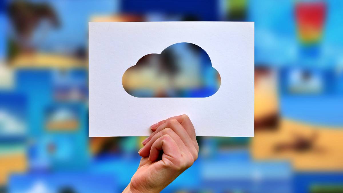 hand holding a cloud cutout