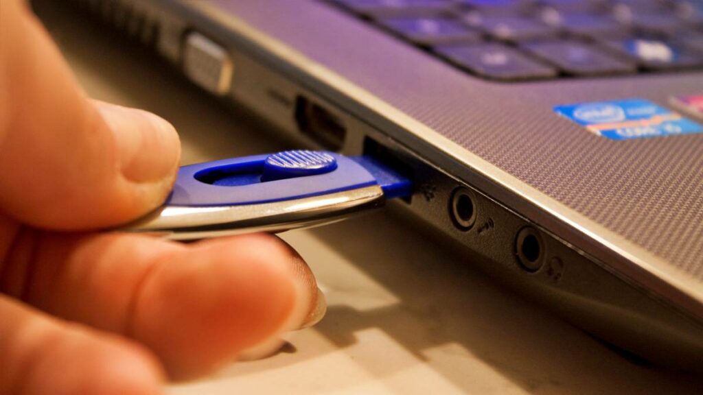 Thumb drive inserted into laptop