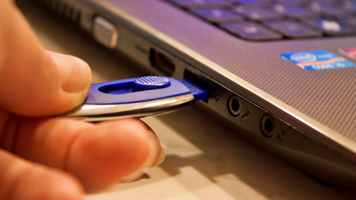 Thumb drive inserted into laptop Thumb drive inserted into laptop