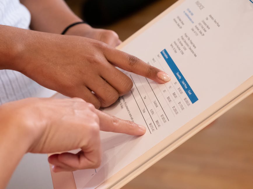 People reviewing an invoice