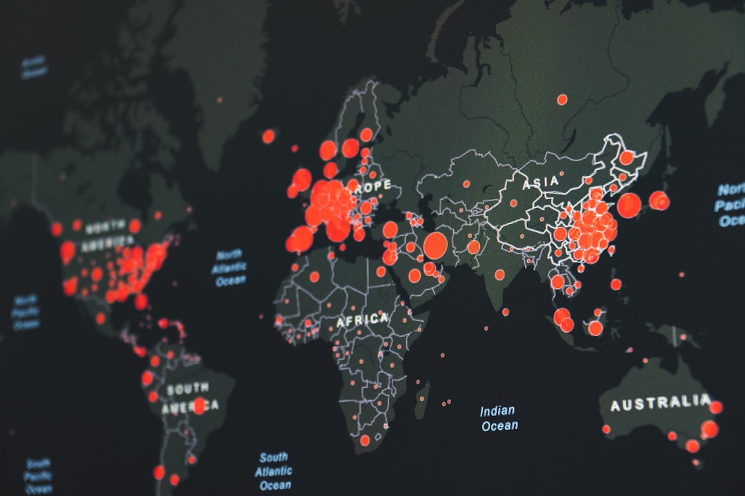 world map with locations Man working at desktop workstation