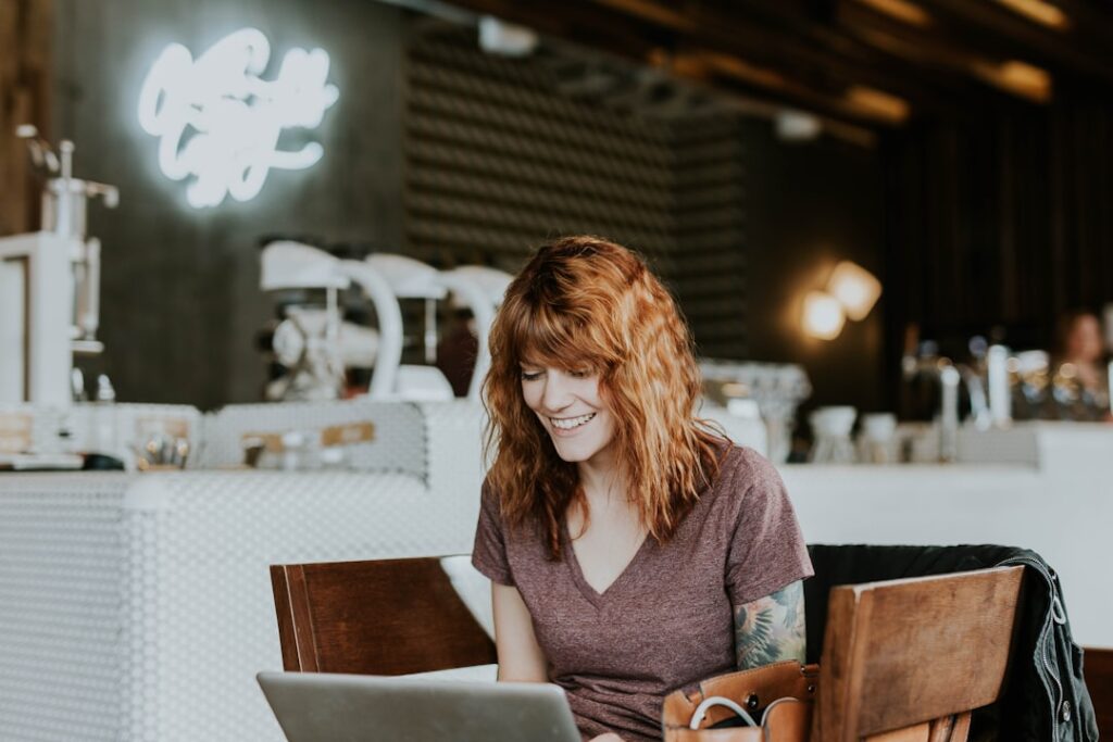woman working with laptop at desk